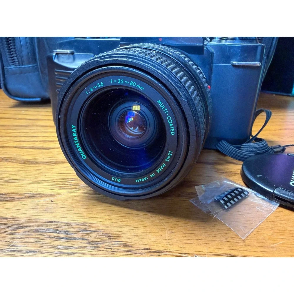 Canon T50 35mm SLR Film Camera with Quantaray 35-80mm Lens and Ambico Bag Bundle